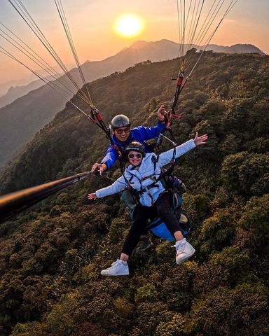Paragliding at sunset